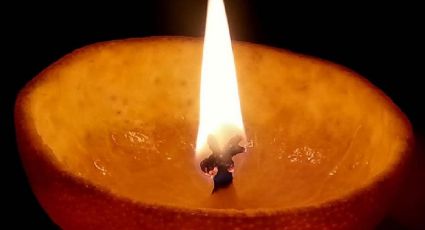 Elabora velas casera usando la cáscara de la naranja o mandarina